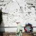  Ann Arbor resident Phyllis Steiner inspects the wreath and memorial at Arbor Crest Memorial Park on Sunday, May 26. She attended the event with her husband who is a World War II veteran. Daniel Brenner I AnnArbor.com